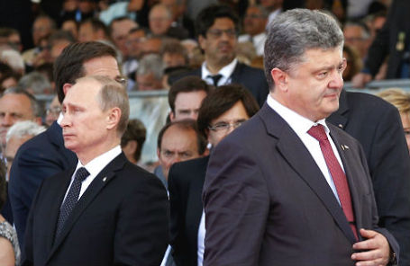 Избранный президент Украины Пётр Порошенко и президент России Владимир Путин.